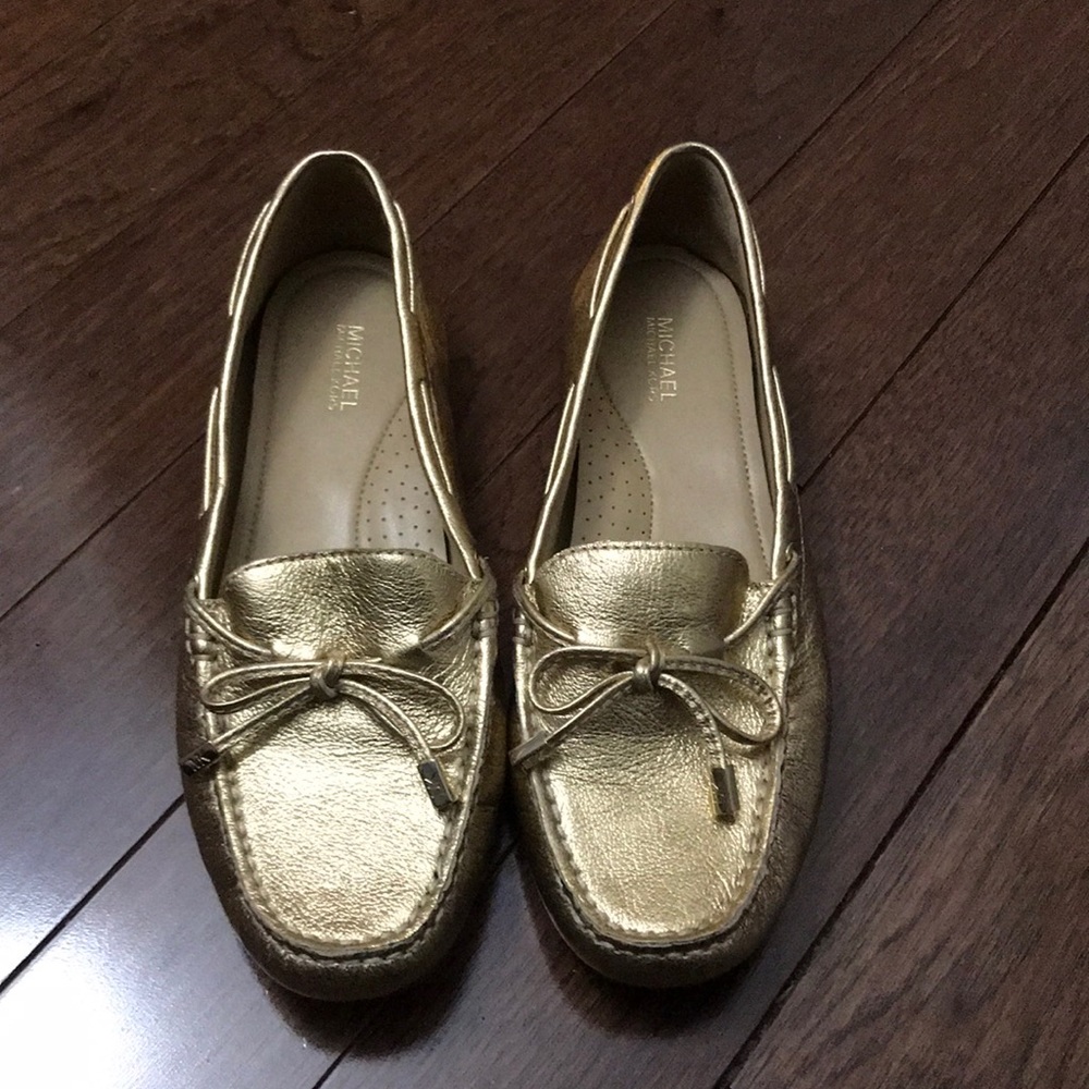 Michael Kors gold flats